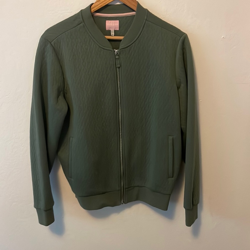 Perfect condition bomber jacket with soft sage green material.